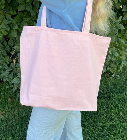 Large zippered tote bag with small inside zippered pocket. 