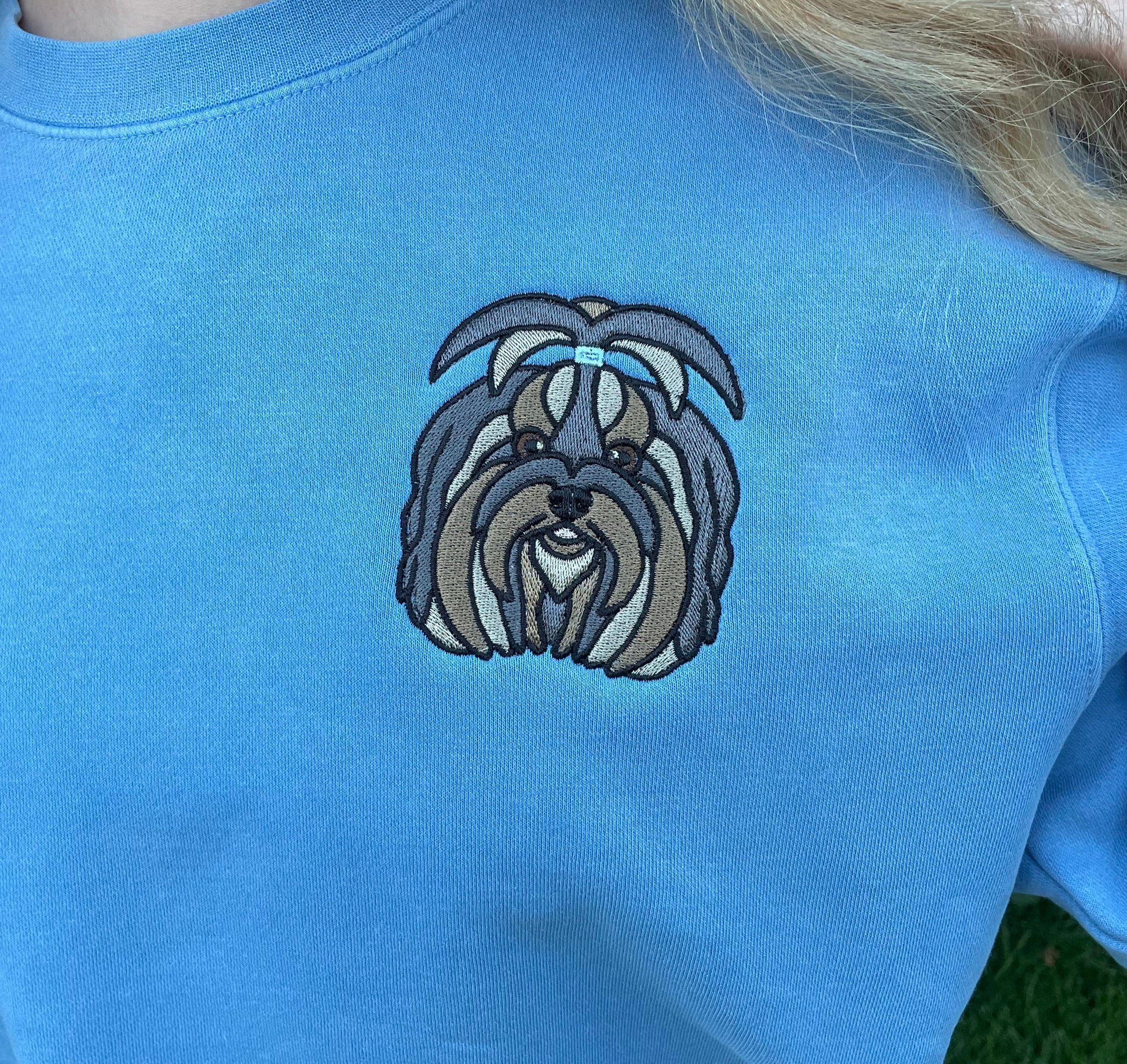 Soft, comfortable, high quality crewnecks. Colors available are pigment pink, baby blue, and forrest green. Personalized with Löwchen dog breed on front (Size 4X4in). Left chest embroidered graphic with a unisex fit, mid-weight fabric.