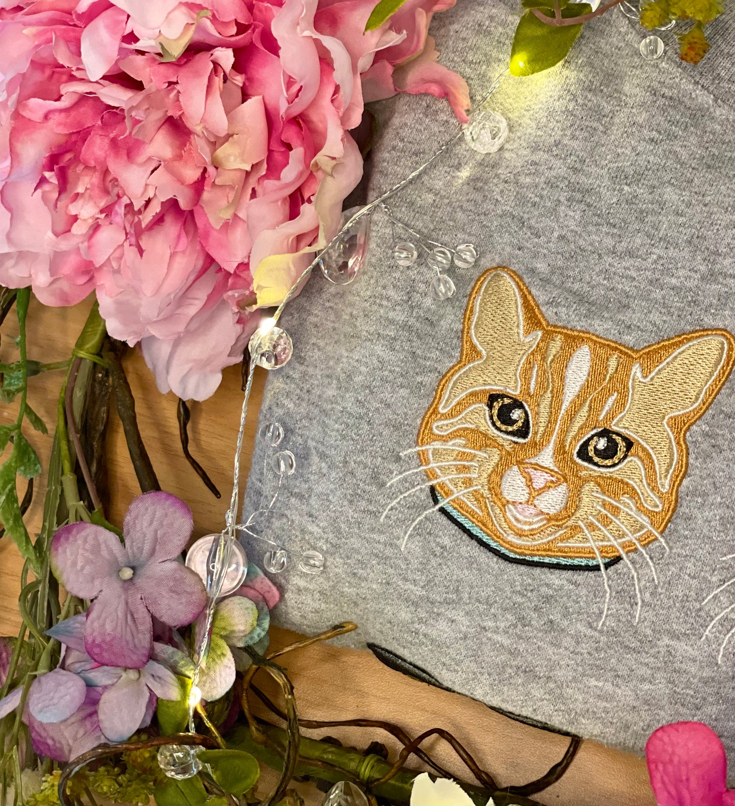 Orange Cat personalized Sweatshirt, embroidered orange cat left chest 4x4 inches. Available in sizes S-3XL. Available crew colors include pigment pink, forest green and baby blue. 