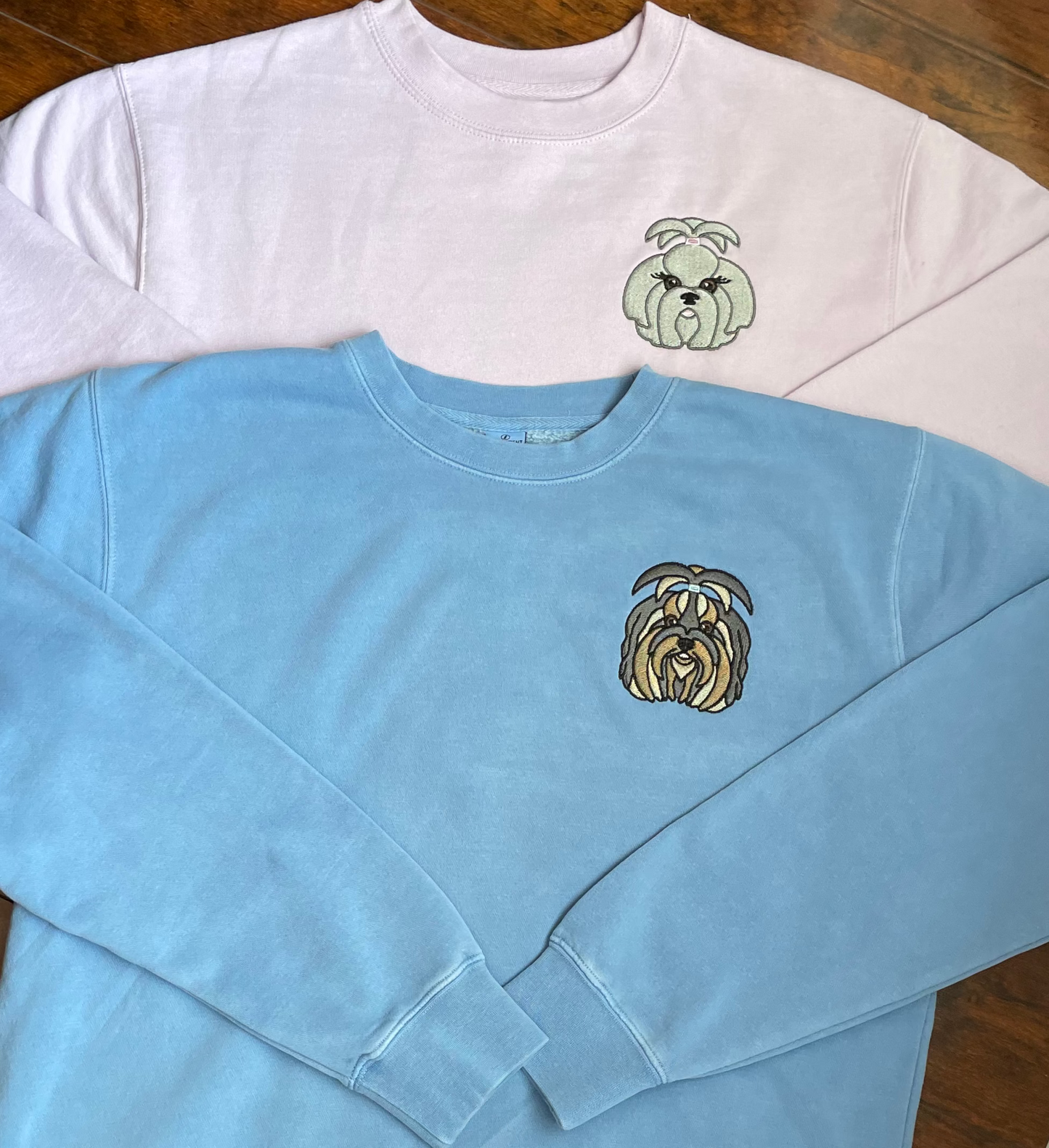 Soft, comfortable, high quality crewnecks. Colors available are pigment pink, baby blue, and forrest green. Personalized with gray Shih Tzu dog on front. (Size 4X4 in.) Left chest embroidered graphic with a unisex fit, mid-weight fabric.