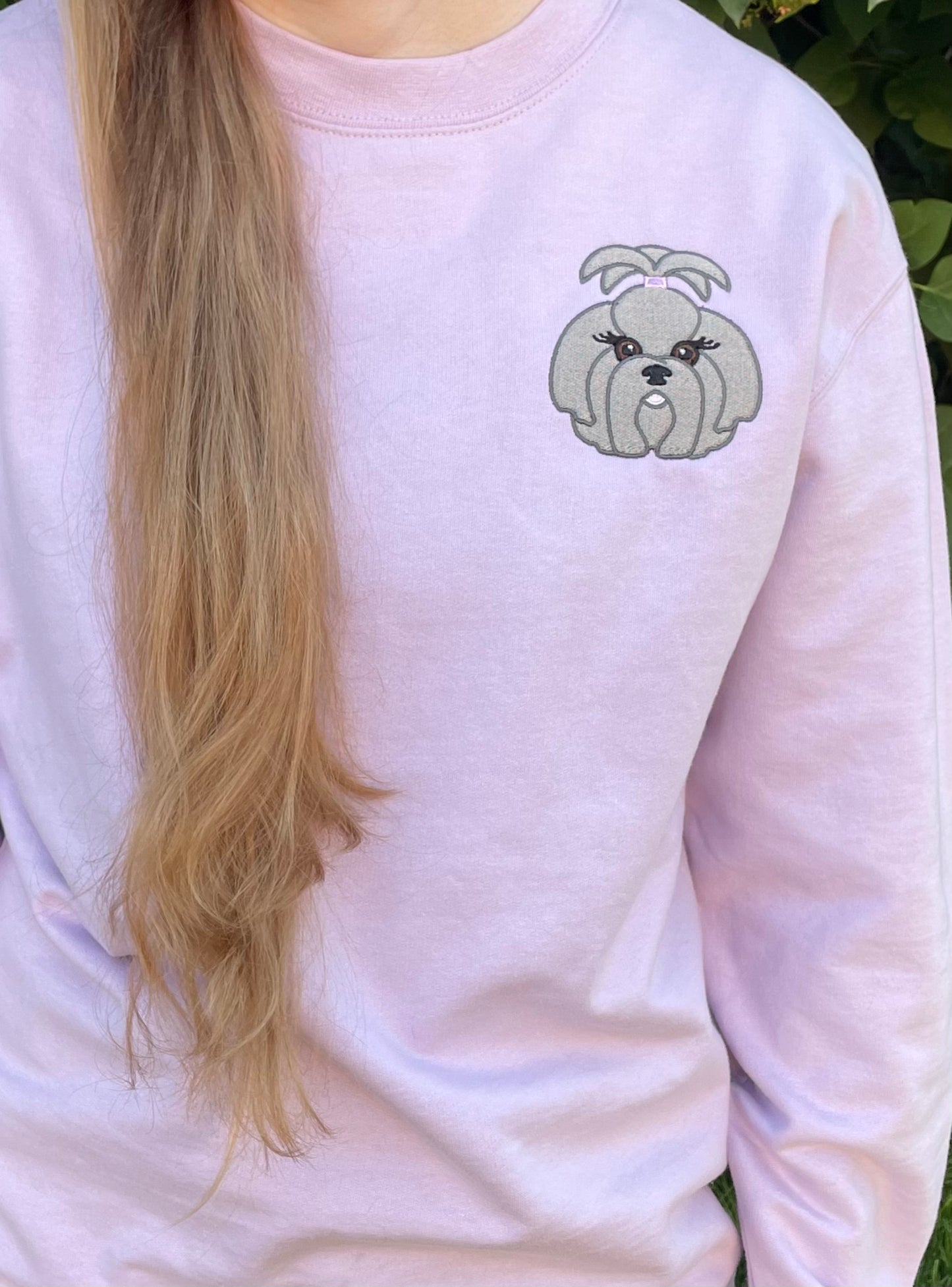 Soft, comfortable, high quality crewnecks. Colors available are pigment pink, baby blue, and forrest green. Personalized with Shih tzu dog breed on front. (Size 4X4in) Left chest embroidered graphic with a unisex fit, mid-weight fabric.